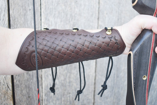 Leather Arm Guard, Archery Arm Guard, for traditional archery is extra long with pointed ends and basketweave tooling