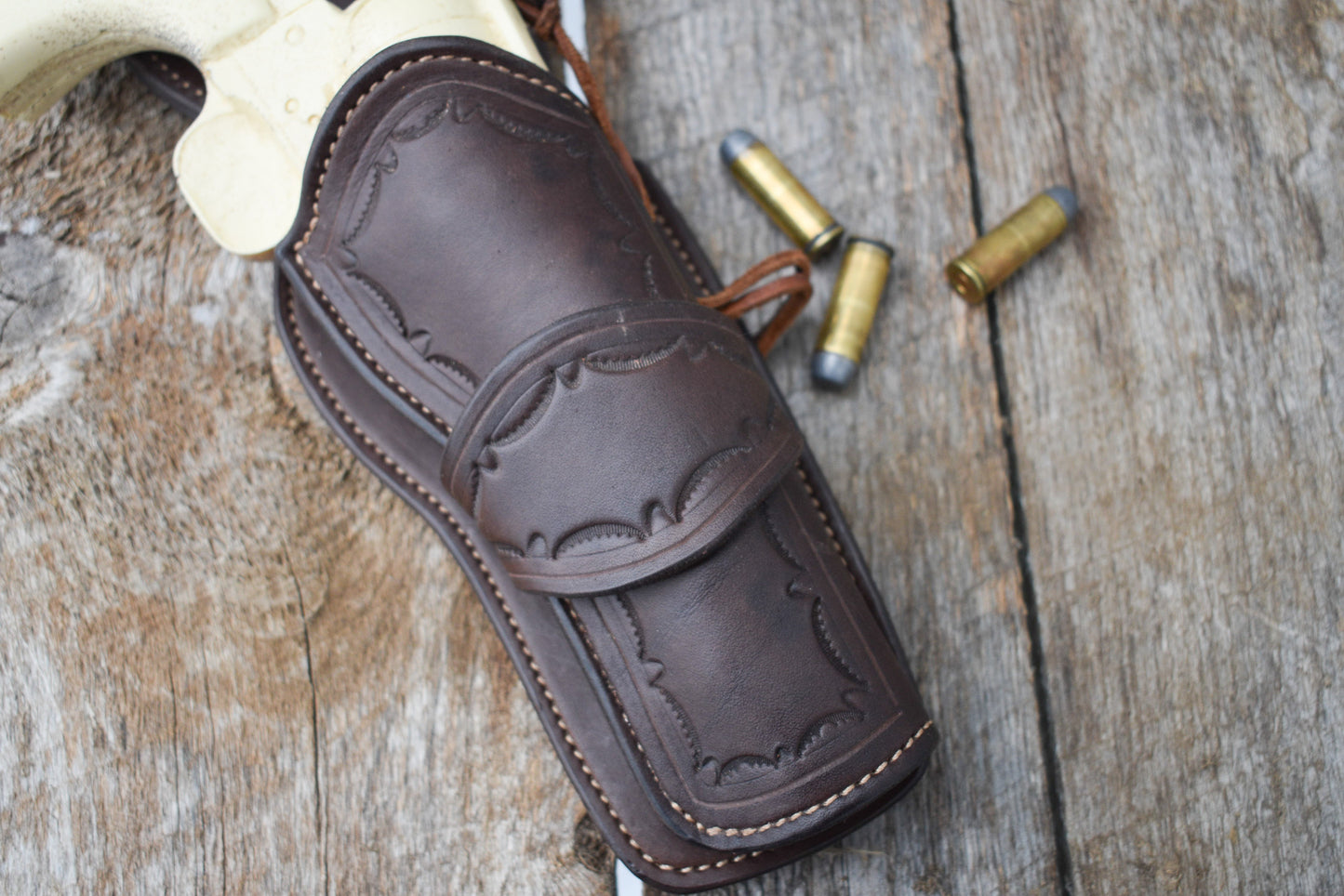 The Rogers Hill Ransacker Leather Cartridge Belt, Western Cartridge Belt with single Fast Draw holster, lined and tooled